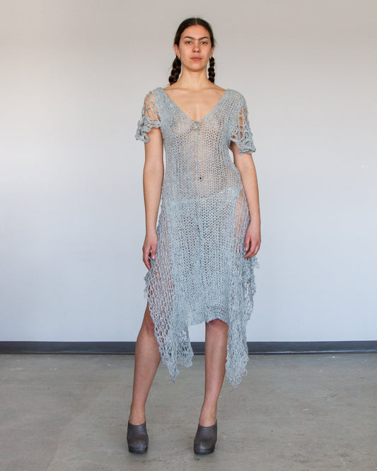 Hand-knitted frilled dress